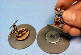 The 60mm round bases with 25mm washers from my local hardware store.