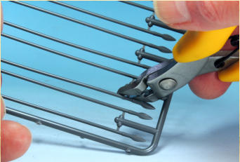 Carefully remove the spears from the sprue using side-cutters, this is much safer than using a knife. 