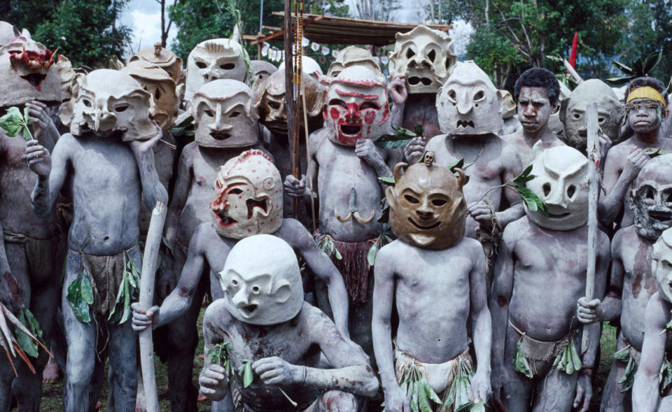 The "Mudmen" of Papua New Guinea's Asaro tribe, also known as the Holosa, are those who wear a traditional costume centered around masks made of mud. They reside near the village of Goroka in the Eastern Highlands Province of Papua New Guinea.