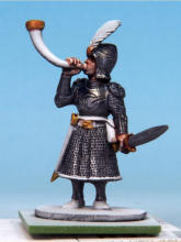 The flesh is painted with Crusader Skin. I applied a coat of Crusader Skin to the sword hilts, buckles, and sections of the greaves, muting the Glittering Loot and sharpening the details.