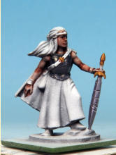 The flesh is painted with Crusader Skin. I applied a coat of Crusader Skin to the sword hilts, buckles, and sections of the greaves, muting the Glittering Loot and sharpening the details.
