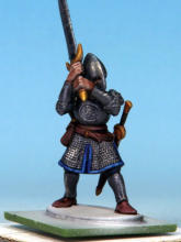 Eyes and teeth in Fanatic: Matt White. Circlet, amulet, horn fittings in Golden Armour. Weapon hafts, sword grips, shield backs in Dark Wood. Horn in Pallid Bone (two coats). Rock in Ashen Stone. Jewel in circlet in Carmine Dragon.