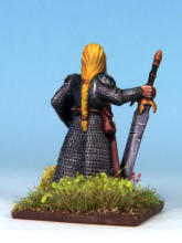 Sharp sand was applied to the base with PVA, hardened, then painted to match existing bases. Oak Brown base, dry-brushed with Desert Yellow and Skeleton Bone. Finished with Gamers Grass tufts and flock.