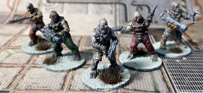 David Bagdan. Omnipotent Automatons. Good choices of colours to differentiate between ranged and close combat models, and extra details such as barcodes add further interest.