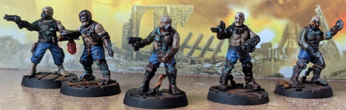 Christopher Chetwood. Pit Slave Crew. Two units painted! The vibrant blue of the first unit contrast nicely with the dirty overall look of the unit. 