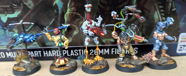 Simon Fairweather. Flybotz. Clever conversions that stay true to the Automaton aesthetic, Well painted using bright colours to emphasise the craziness of the group, Unified basing ties the unique models together beautifully.