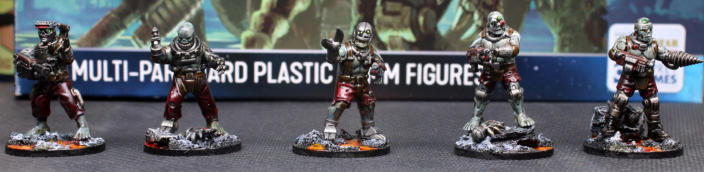 Colin Woods. Rogue Automatons. The skin is nicely done and looks suitable rotten/dead by using green and greys. Nice lava effect bases.