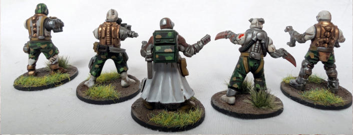 Bronze detailing adds contrast, and the camouflage is crisply applied. The leader conversion is an effective use of a scavengers, with bases kept clean and cohesive. 