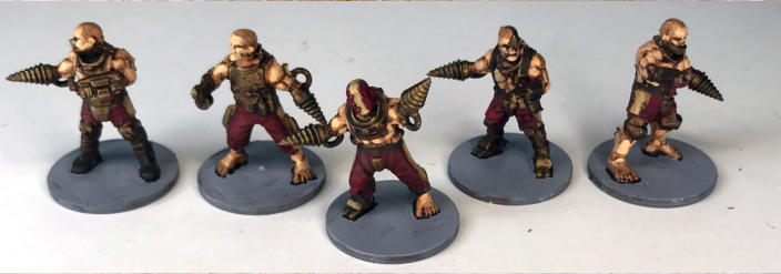 Peter Gray. Rockdrill Prime and the THUNDERCUBE! cyborg gladiator team, ROCKDRILL OMEGA ROCKDRILL! Uniform armaments give strong unit cohesion, supported by a rich bronze finish that adds depth. The impressionistic flesh tones are a bold choice.