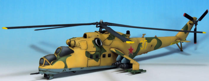 Its popular to describe the Hind as a flying tank, but flying infantry fighting vehicle is a more accurate description. Inventor Mikhail Mils initial mock-up of the V-24which would become the Hindwas actually similar to the U.S. Armys UH-1 Huey .