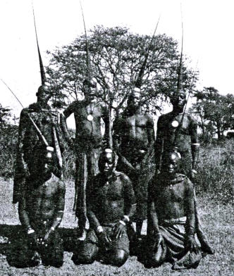 Young Ila warriors with freshly done hair cone or isusu.
