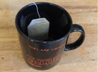 We say ‘cup’, but actually mean a Mug. Cups are for sissys, and saucers just invoke the ancestral spirit of Ned Ludd in us. So get a good mug, take the teabag out of it’s sachet, unravel the string and drop the bag into the mug. Make sure the bag’s string